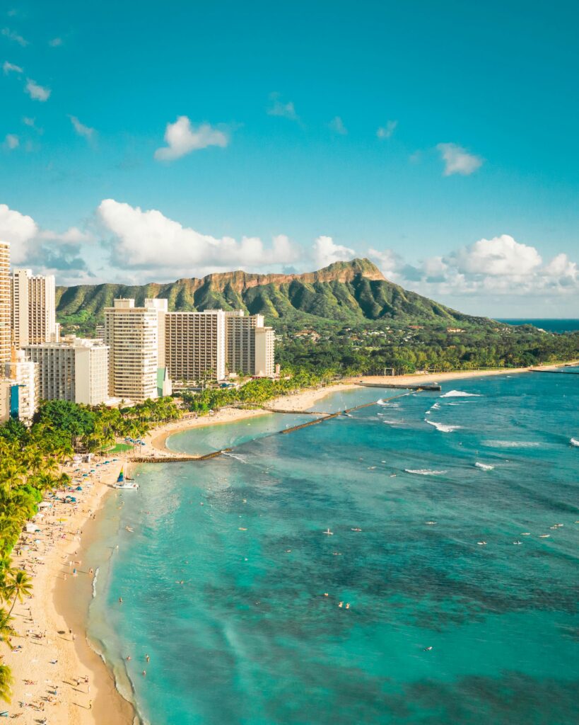 pexels-photo-4321407-4321407 Stunning aerial view of Waikiki Beach, Honolulu with Diamond Head in the background, perfect ocean scenery.